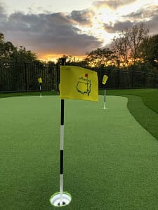 putting-Putting-Green-Fringe-Engineering-Florida-fringe - Sims & Greens Technical view of an artificial putting green installation in Florida showing the precision-cut fringe border and high-density synthetic turf fibers.