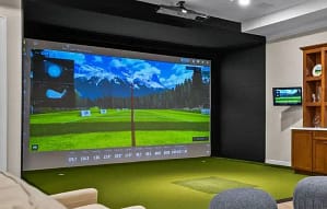 uneekor-eye-xo2-overhead-launch-monitor-custom-simulator-tampa - Sims & Greens - Sims & Greens A close-up view of a premium Uneekor EYE XO2 overhead launch monitor mounted to the ceiling of a custom luxury home golf simulator in Tampa Bay, designed for a clean, cable-free hitting area and tour-level accuracy.